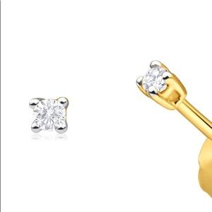 Pair of diamond studs.total weight .10 cts.